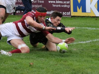 MATCH REPORT: Hosts hold on under pressure