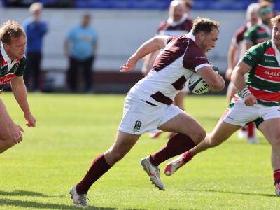 A Century in Maroon and White